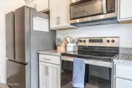 1802 Gracie Lane, Carthage, NC 28327 — 3-bedroom townhome in Carriage Place, Carthage, NC, photo 12 of 28: Kitchen with Stainless Steel Appliances