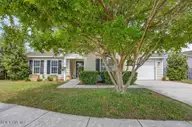 1049 Jt Westfield Drive, Leland, NC 28451 — 3-bedroom waterfront home in Lena Springs Estates, Leland, NC, photo 1 of 41: Front