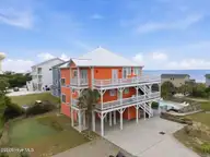100 9th Street, Emerald Isle, NC 28594 — 6-bedroom waterfront home in Emerald Isle By The Sea, Emerald Isle, NC, photo 9 of 64: West Side