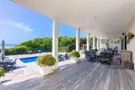 585 Forest Dunes Drive, Pine Knoll Shores, NC 28512 — 4-bedroom waterfront home in Beacon's Reach, Pine Knoll Shores, NC, photo 6 of 68: First floor deck