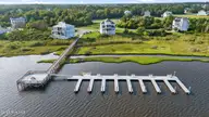 537 Moss Lake Lane, Holly Ridge, NC 28445 — 3-bedroom home in Summerhouse On Everett Bay, Holly Ridge, NC, photo 6 of 72: 74_dji_20240815181047_0085_d