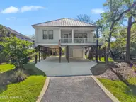 110 SE 14th Street, Oak Island, NC 28465 — 3-bedroom home, Oak Island, NC, photo 2 of 57: 110SE14thSt - 1