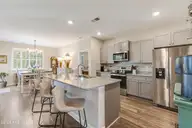 1728 Culdees Lane SE, Bolivia, NC 28422 — 3-bedroom home in Avalon, Bolivia, NC, photo 13 of 57: Open concetpkitchen & dinning