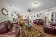 1601 River Bluff Road, Morehead City, NC 28557 — 3-bedroom waterfront home in South Shores, Morehead City, NC, photo 11 of 32: Family Room