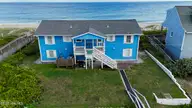 101 Ocean Drive, Emerald Isle, NC 28594 — 7-bedroom waterfront home, Emerald Isle, NC, photo 1 of 60: better road front