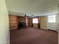 118 Oakwood Drive, Havelock, NC 28532 — 4-bedroom home, Havelock, NC, photo 21 of 56: Family room