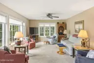 105 Laurel Court, Pine Knoll Shores, NC 28512 — 3-bedroom home in Piksco, Pine Knoll Shores, NC, photo 17 of 64: Family room