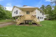614 Cape Fear Drive, Burgaw, NC 28425 — 3-bedroom waterfront home in River Bend, Burgaw, NC, photo 2 of 72: 4-web-or-mls-GI - 614 Cape Fear Dr - Lis