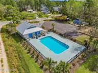 120 N Brig Drive, Hampstead, NC 28443 — 4-bedroom home in Saltwater Landing, Hampstead, NC, photo 7 of 46: 78_pool
