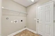 611 Weeping Willow Lane, Jacksonville, NC 28540 — 4-bedroom home in Blue Creek Estates, Jacksonville, NC, photo 18 of 51: Laundry area