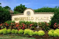 6964 52 Rosebury Court SW, Ocean Isle Beach, NC 28469 — lot in Ocean Ridge Plantation, Ocean Isle Beach, NC, photo 10 of 30: Sedgefield Place Monument1