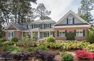 60 Oak Meadow Road, Pinehurst, NC 28374 — 4-bedroom home in Fairwoods on 7, Pinehurst, NC, photo 1 of 67: FrontExterior2