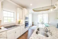 5307 Marco Drive SE, Southport, NC 28461 — 3-bedroom home in The Home Place of Southport, Southport, NC, photo 19 of 56: 18- Kitchen