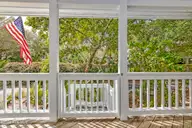 23 Ibis Roost, Bald Head Island, NC 28461 — 3-bedroom home in Ibis Roost, Bald Head Island, NC, photo 7 of 40: Covered Porch