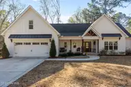 4 Oakmont Drive, Pinehurst, NC 28374 — 4-bedroom home in Unit 1, Pinehurst, NC, photo 1 of 47: Front