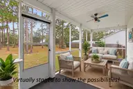2311 E Boiling Spring Road, Southport, NC 28461 — 3-bedroom home in Boiling Spring Lakes, Southport, NC, photo 24 of 45: Phoot 28 screen porch AI