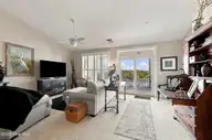 150 Lands End Court A42, Morehead City, NC 28557 — 3-bedroom waterfront condo in The Shores at Spooners Creek, Morehead City, NC, photo 12 of 50: Living to Balcony