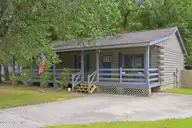 866 Mill River Road, Jacksonville, NC 28540 — 3-bedroom home in West River, Jacksonville, NC, photo 1 of 37