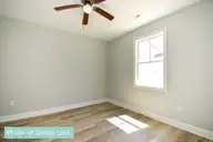 214 Sandy Cove Lane, Sneads Ferry, NC 28460 — 3-bedroom townhome in Beachside Commons, Sneads Ferry, NC, photo 15 of 38: 1st Floor Bedroom