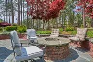 36 Greencastle Drive, Pinehurst, NC 28374 — 4-bedroom home in National, Pinehurst, NC, photo 23 of 57: Patio and firepit