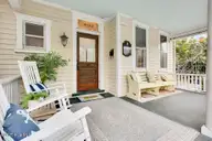 402 S 5th Avenue, Wilmington, NC 28401 — 3-bedroom home in Historic District, Wilmington, NC, photo 5 of 52: Rocking chair front porch