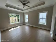 117 Flat Clam Drive, Wilmington, NC 28401 — 3-bedroom home in Riverside Cove, Wilmington, NC, photo 18 of 28: Owners Bedroom