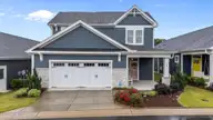 33 Davidson Street, Clayton, NC 27527 — 4-bedroom home in The Walk at East Village, Clayton, NC, photo 1 of 41: Front of house