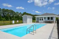 227 Sandy Cove Lane, Sneads Ferry, NC 28460 — 3-bedroom townhome in Beachside Commons, Sneads Ferry, NC, photo 23 of 30: Community Pool