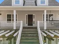 1039 Chadwick Shores Drive, Sneads Ferry, NC 28460 — 3-bedroom waterfront home in Chadwick Shores, Sneads Ferry, NC, photo 4 of 59: DJI_20260301115716_0116_D