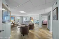 5419 W Beach Drive, Oak Island, NC 28465 — 7-bedroom waterfront home, Oak Island, NC, photo 22 of 69: 21_family room