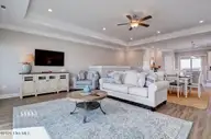 208 Goldsboro Drive, North Topsail Beach, NC 28460 — 6-bedroom waterfront townhome in Topsail Wynds, North Topsail Beach, NC, photo 14 of 51: living room 3