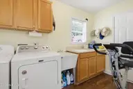 409 Neuchatel Road, New Bern, NC 28562 — 3-bedroom home in Taberna, New Bern, NC, photo 24 of 40: Laundry