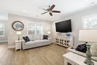135 NE 75th Street, Oak Island, NC 28465 — 4-bedroom home in Tranquil Harbor, Oak Island, NC, photo 11 of 37: Living Room