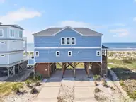 917 E Beach Drive, Oak Island, NC 28465 — 6-bedroom waterfront home, Oak Island, NC, photo 1 of 70