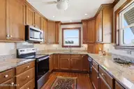 205 Club Colony Drive, Atlantic Beach, NC 28512 — 5-bedroom waterfront home in Club Colony, Atlantic Beach, NC, photo 10 of 38: Kitchen