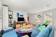 1530 Salter Path Road 15, Indian Beach, NC 28512 — 2-bedroom waterfront manufactured home in Tradewinds, Indian Beach, NC, photo 14 of 32: Living Room