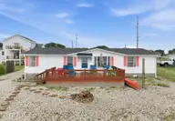 1072 Salter Path Road, Salter Path, NC 28512 — 3-bedroom waterfront manufactured home, Salter Path, NC, photo 1 of 50: Exterior