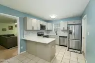405 Chaps Court, Jacksonville, NC 28546 — 4-bedroom home in Horse Creek Farms, Jacksonville, NC, photo 3 of 45