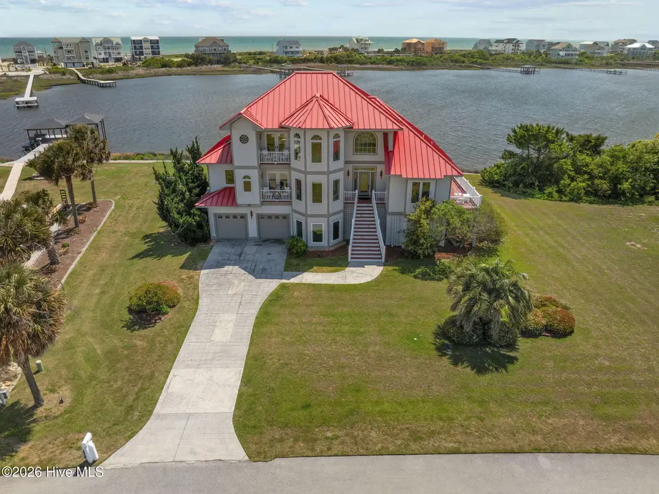 18 Sailview Drive, North Topsail Beach, NC 28460 — 4-bedroom waterfront home in Cape Island, North Topsail Beach, NC, photo 1 of 65: 81-web-or-mls-Virtual Dusk