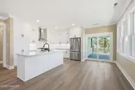 309 Shipwreck Lane, Emerald Isle, NC 28594 — 4-bedroom home in Spinnakers Reach, Emerald Isle, NC, photo 7 of 45: Dining and Kitchen Area