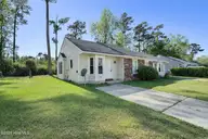 1941 Rolling Ridge Drive, Midway Park, NC 28544 — 2-bedroom townhome in Hunters Creek, Midway Park, NC, photo 1 of 14: Front of property
