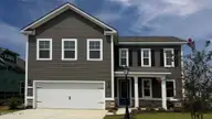 2131 Marietta Circle NW, Ash, NC 28420 — 4-bedroom home in Brunswick Plantation, Ash, NC, photo 1 of 17