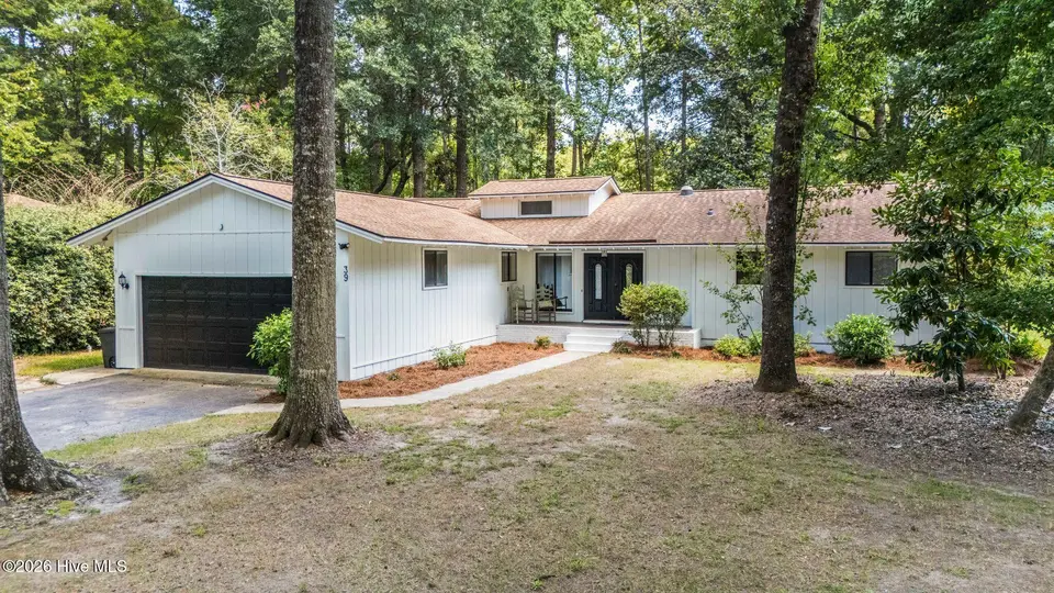 39 Swamp Fox Drive, Carolina Shores, NC 28467 — 3-bedroom home in Carolina Shores, Carolina Shores, NC, photo 1 of 32