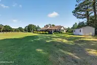 106 Bogey Court, Hampstead, NC 28443 — 4-bedroom home in Belvedere, Hampstead, NC, photo 8 of 52: 106BogeyCourt-8