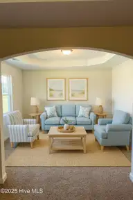1115 Lunenburg Place, Jacksonville, NC 28540 — 5-bedroom home in Wedgewood, Jacksonville, NC, photo 23 of 27: 1115 Lunenburg Staged-Primary Sitting