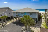 603 N Anderson Boulevard, Topsail Beach, NC 28445 — 4-bedroom waterfront home in Topsail Beach, Topsail Beach, NC, photo 1 of 35: DJI_20260519031821_0228_D copy