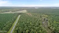 207 Garbacon Drive, Beaufort, NC 28516 — waterfront lot in Merrimon Bay, Beaufort, NC, photo 14 of 17: 12-web-or-mls-DJI_20251008124714_0408_D