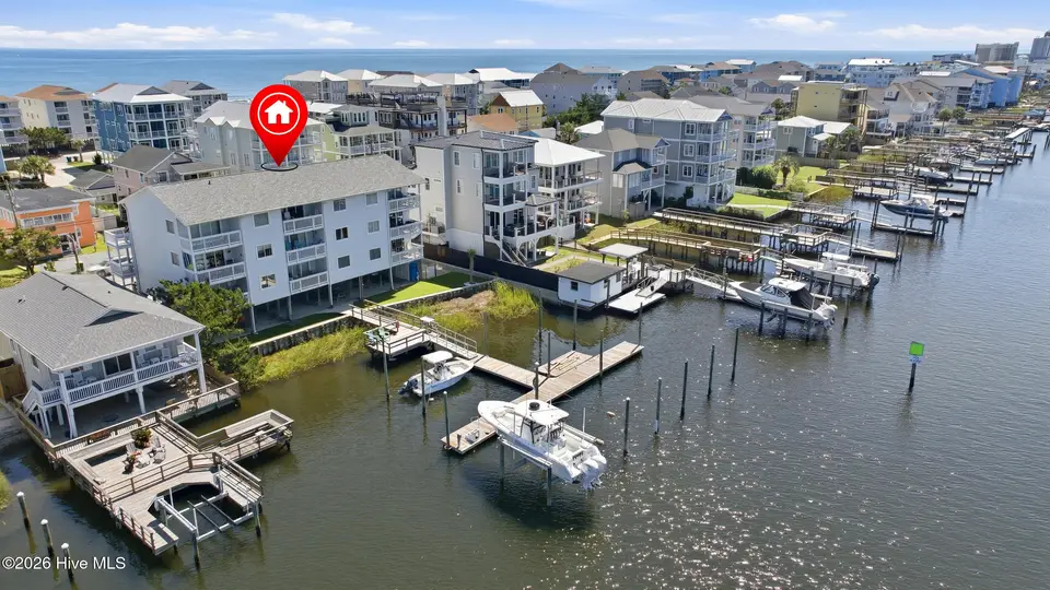 709 Canal Drive Apt 3b, Carolina Beach, NC 28428 — 2-bedroom waterfront condo in Snug Harbour (Carolina Beach), Carolina Beach, NC, photo 1 of 70