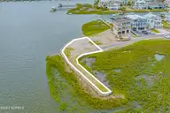 1534 94 Riverside Drive, Sunset Beach, NC 28468 — waterfront lot in Ocean Club Estates, Sunset Beach, NC, photo 2 of 44: Lot 94 Ocean Club Estates