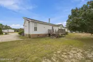 7133 Roebuck Lane NE, Leland, NC 28451 — 3-bedroom manufactured home in Hunters Ridge, Leland, NC, photo 9 of 44: 9_img_0841